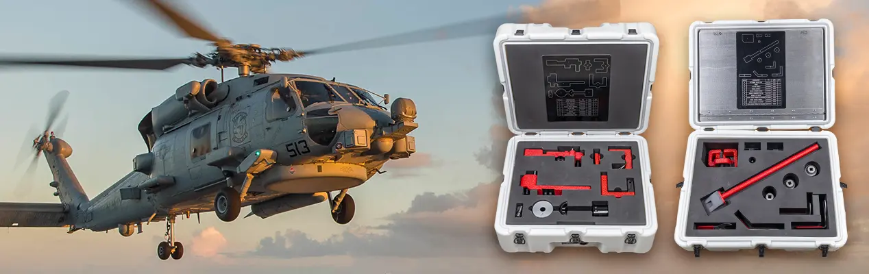 A U.S. Navy Seahawk helicopter landing; inset photo of the H-60 Bridge Tool Kit